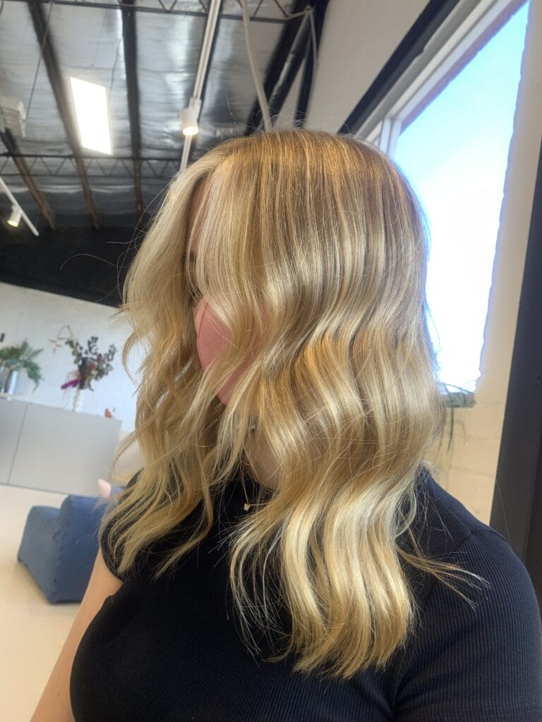 Melbourne hair colour specialist, MARK L HAIR created his stunning buttery blonde using Wella Pro colour to achieve his looks. This bespoke blonde is finished with a long hair cut with face framing layers and a tong to give the hair a wavy style