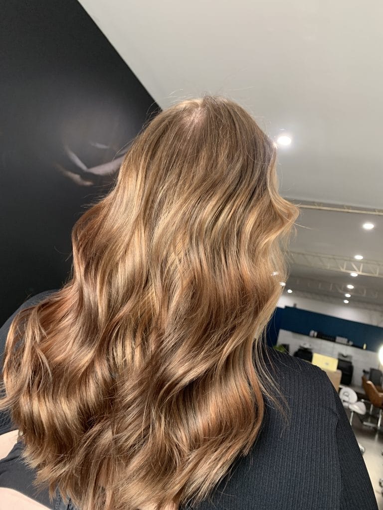 Transform your hair from blonde to a stunning dimensional brunette with this expert colour correction service, provided by a professional hairdresser in St Kilda, Melbourne. Say goodbye to brassy, uneven tones and hello to a beautiful, multi-dimensional hue that perfectly complements your skin tone and facial features.