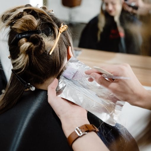 Experience the art of hair colouring with this stunning image of Hawthorn east Hair colour specialst Mark L expertly applying highlights to a client's hair. Using a highlighting technique, this skilled stylist is able to create a natural-looking finish that perfectly complements the client's skin tone and facial features. Whether you're looking to enhance your natural beauty or try something new, this highlighting service is sure to leave you feeling confident and beautiful. Mark is an experienced Hairdresser in Hawthorn and surrounding eastern suburbs